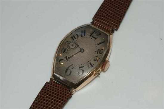 Appraisal: A VINTAGE TONNEAU CASE WRISTWATCH TO A ROSE GOLD PLATED