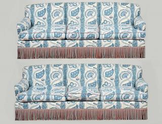 Appraisal: PAIR OF BLUE AND WHITE UPHOLSTERED SOFAS Each with three