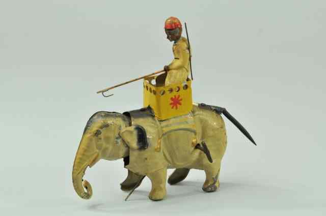 Appraisal: ELEPHANT WITH RIDER IN HOWDAH Gunthermann hand painted tin elephant