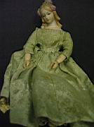 Appraisal: PORCELAIN DOLL WITH WOODEN BODY This doll has wooden arms