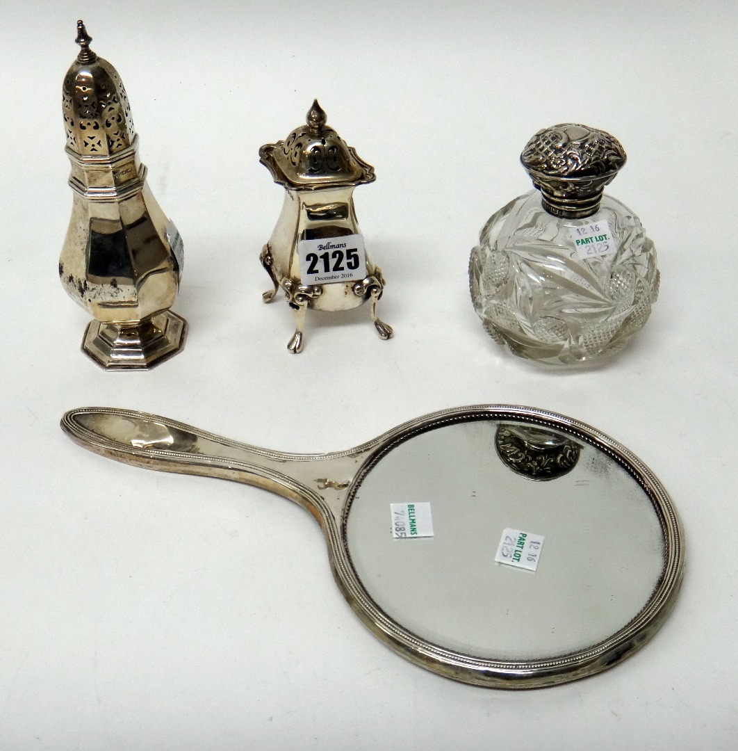 Appraisal: Silver and silver mounted wares comprising a large pepperette raised