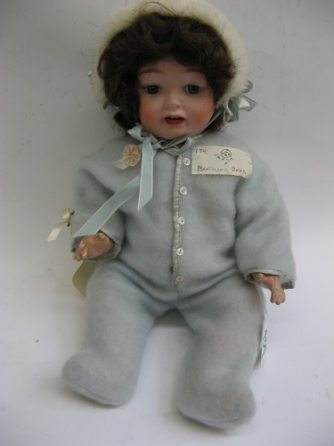 Appraisal: MORIMURA BROTHERS JAPANESE BISQUE HEAD CHARACTER DOLL in swivel head