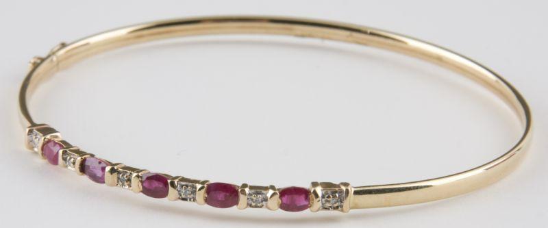 Appraisal: Gold Ruby and Diamond Bangle Bracelet simply set with beautiful