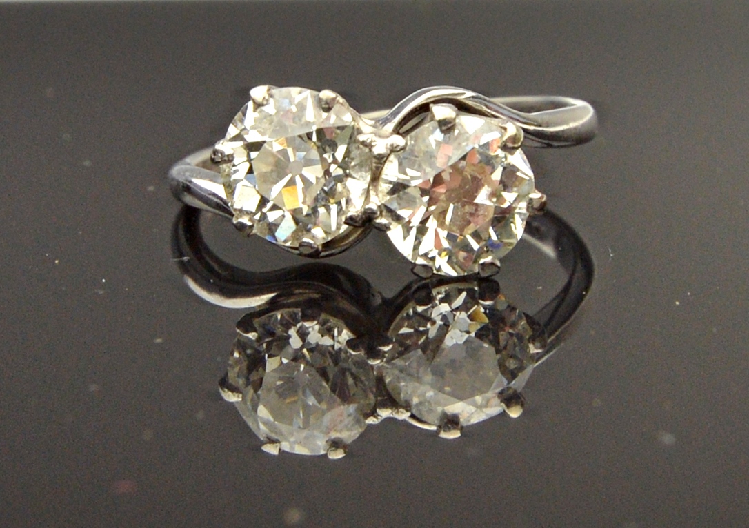 Appraisal: A white gold and platinum diamond set two stone ring