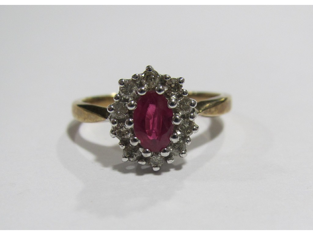 Appraisal: Nine carat gold ruby and diamond cluster ring