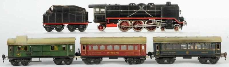 Appraisal: Marklin O-Gauge Passenger Train Set German Wind-cutter steam type engine