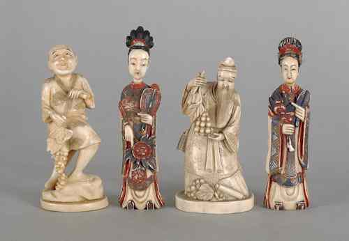 Appraisal: Two Japanese geisha form carved and painted ivory snuff bottles