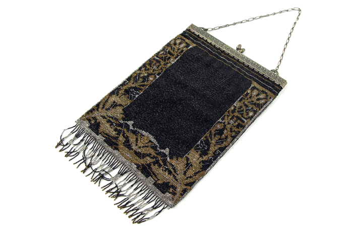 Appraisal: A LADY'S MESH FRINGED EVENING PURSE in classic brown gold