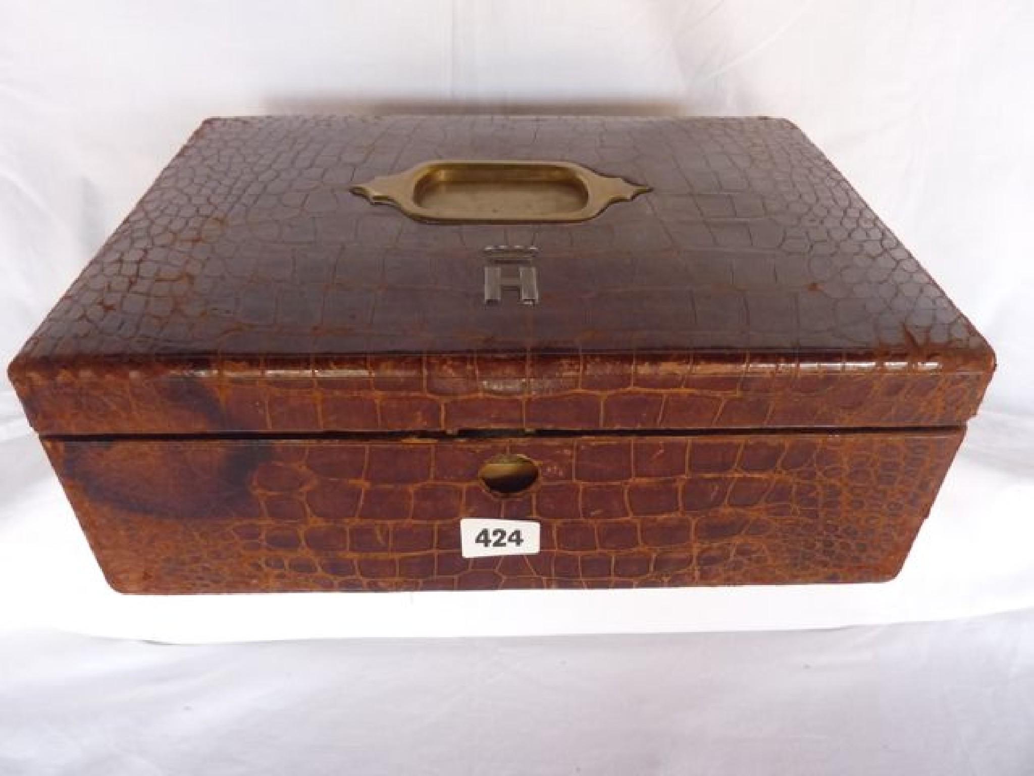 Appraisal: A crocodile skin travel box by Barrett Sons Piccadily the