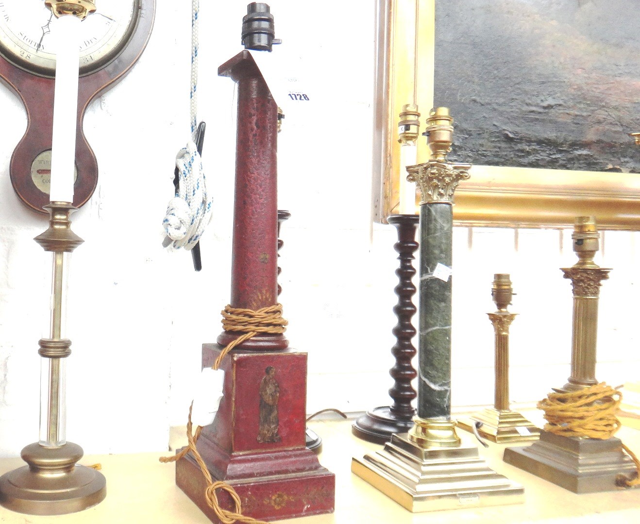 Appraisal: A tole peinte table lamp of Corinthian column form gilt