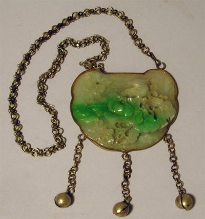 Appraisal: Chinese jade pendant Carved in high relief to show a