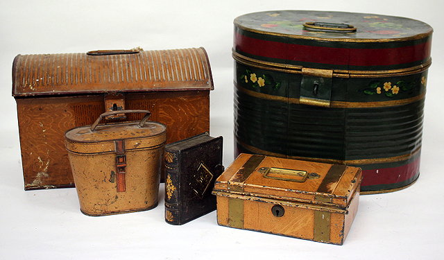 Appraisal: A PAINTED METAL HAT BOX painted with fruit and flowers