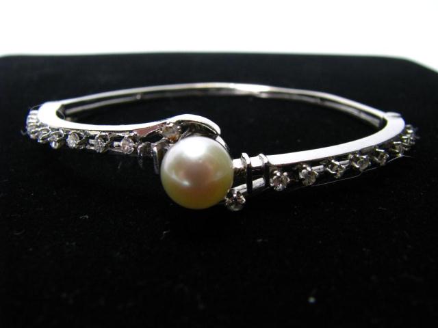 Appraisal: Lady's k white gold bangle with cultured pearl and twenty