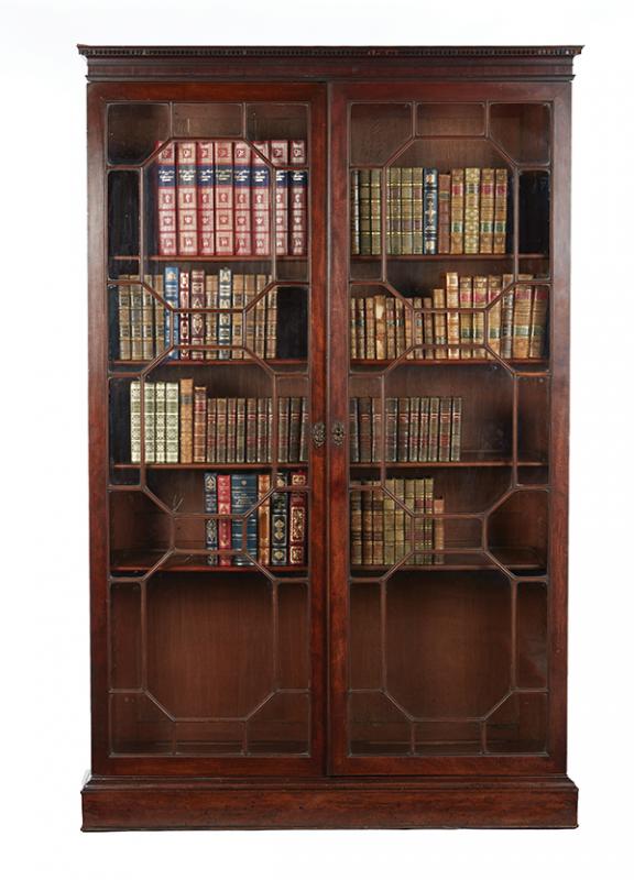 Appraisal: AN EARLY TH CENTURY MAHOGANY TWO DOOR BOOKCASE The dentil