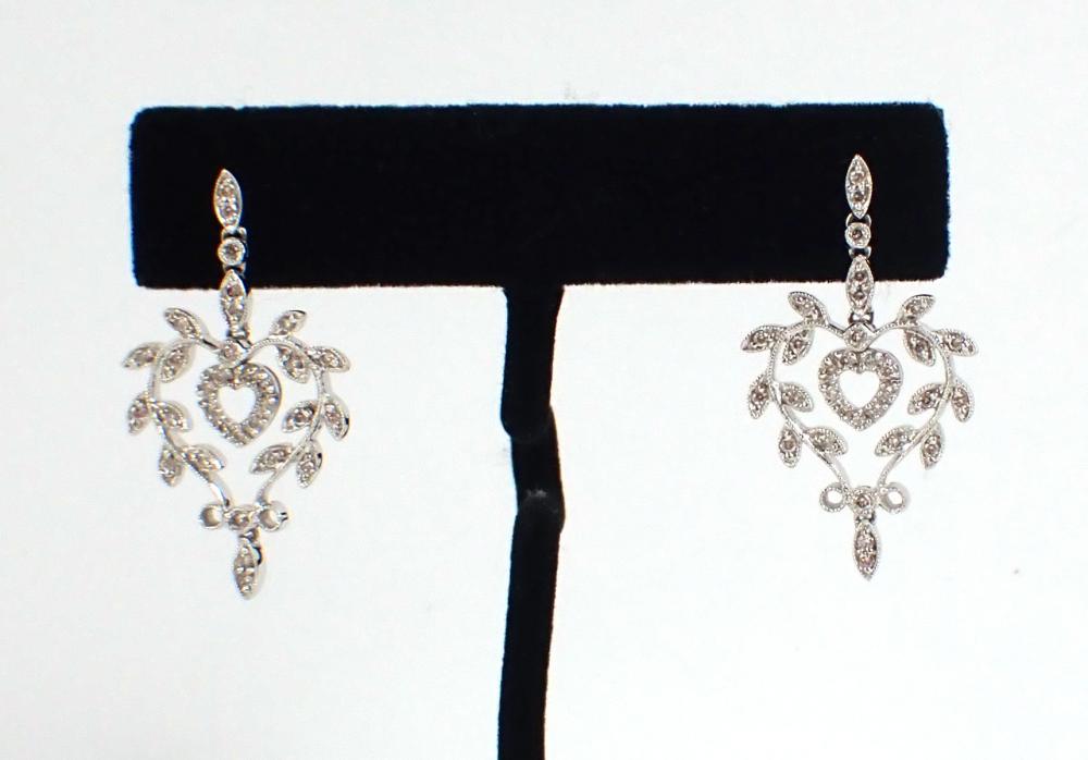 Appraisal: PAIR OF DIAMOND AND FOURTEEN KARAT WHITE GOLD EARRINGS each