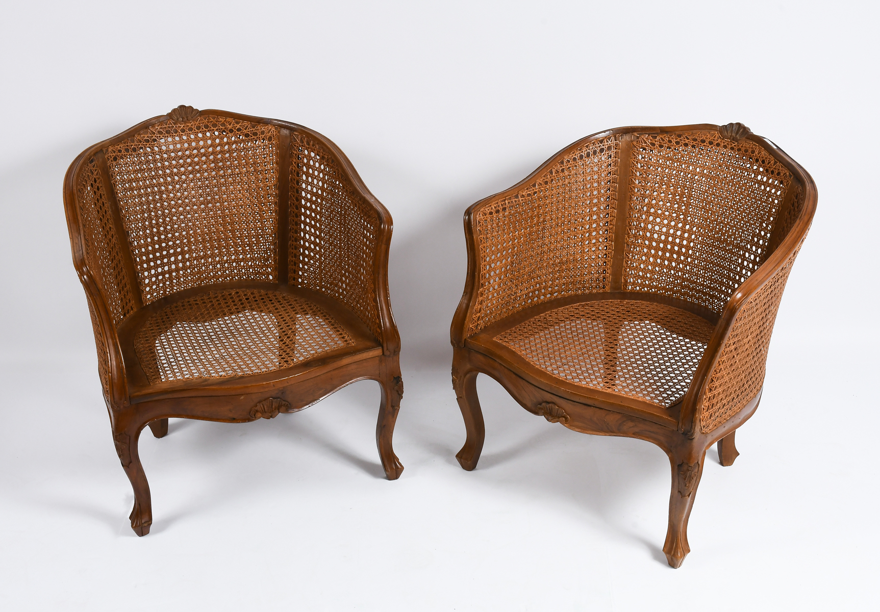 Appraisal: PAIR OF FRENCH CANED BERGERE CHAIRS Having double caned backrest