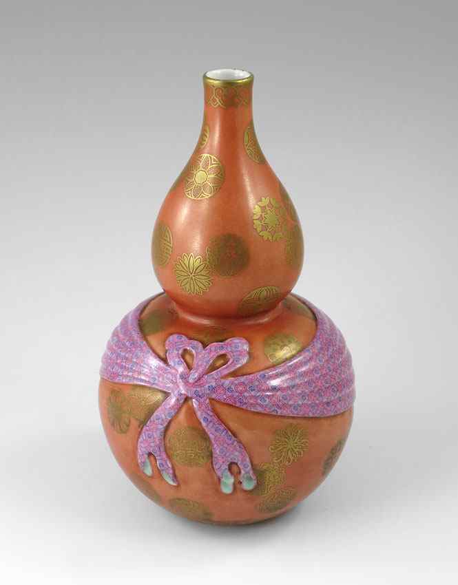 Appraisal: UNUSUAL CHINESE DOUBLE GOURD VASE Decorated with gold medallions and