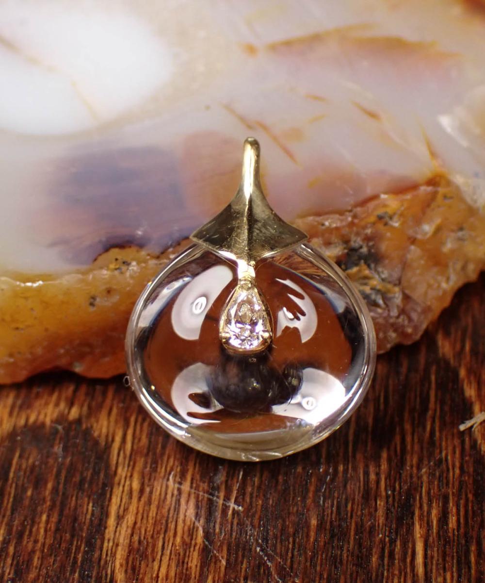 Appraisal: DIAMOND ROCK CRYSTAL AND EIGHTEEN KARAT GOLD PENDANT The k