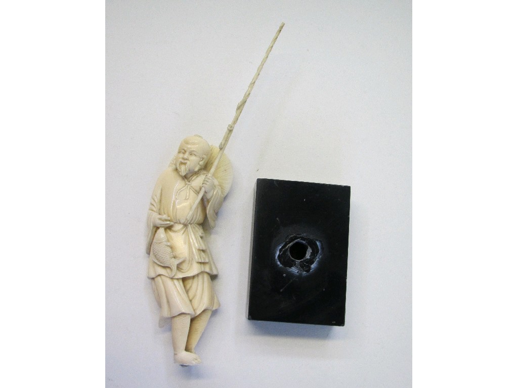 Appraisal: Japanese carved ivory figure of a fisherman