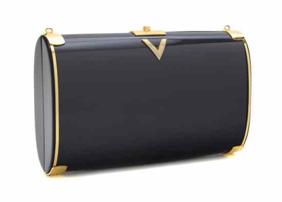 Appraisal: A Mario Valentino Pewter Hardsided Clutch goldtone hardware gray leather