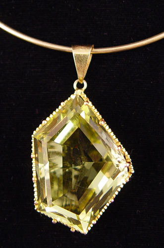 Appraisal: CT CITRINE PENDANT NECKLACE k yellow gold rigid wire necklace