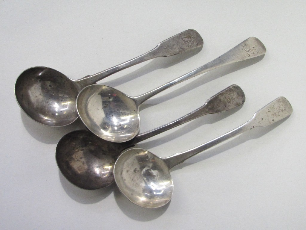 Appraisal: Lot comprising four antique silver sauce ladles assorted marks