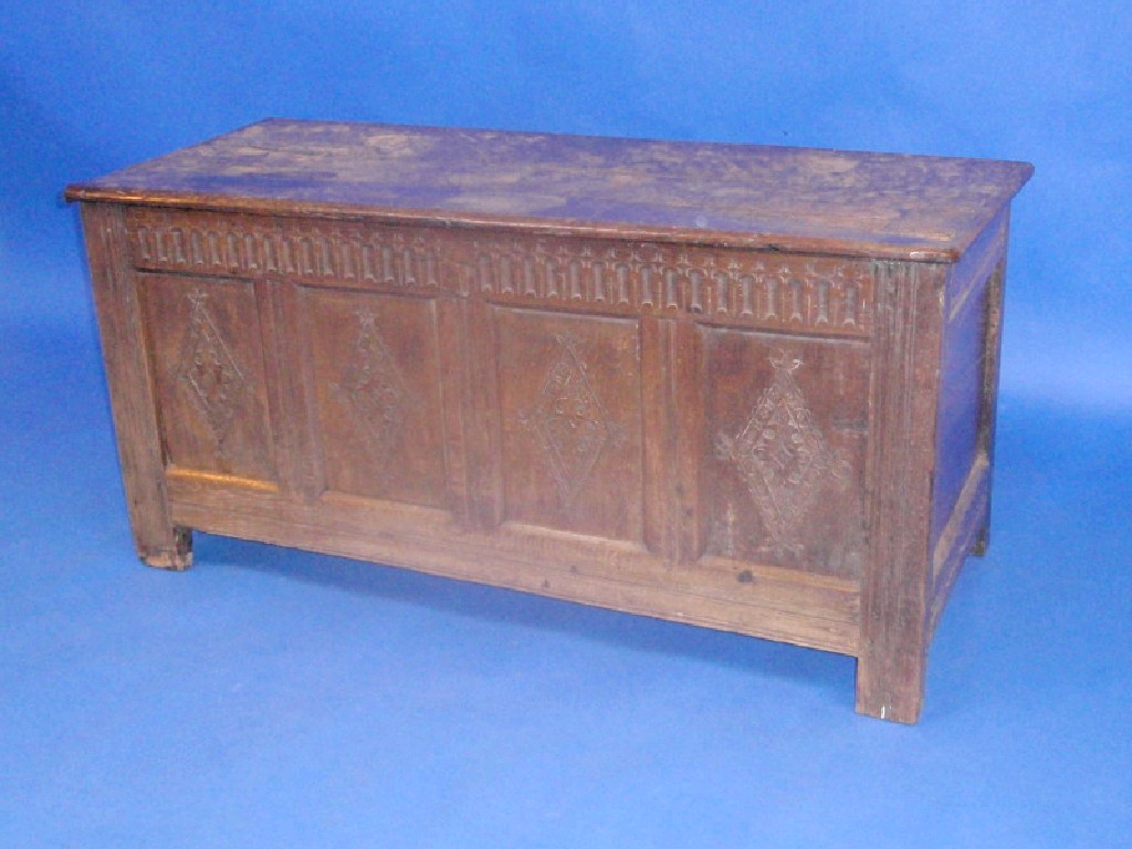 Appraisal: A thC oak coffer with plain top and four lozenge