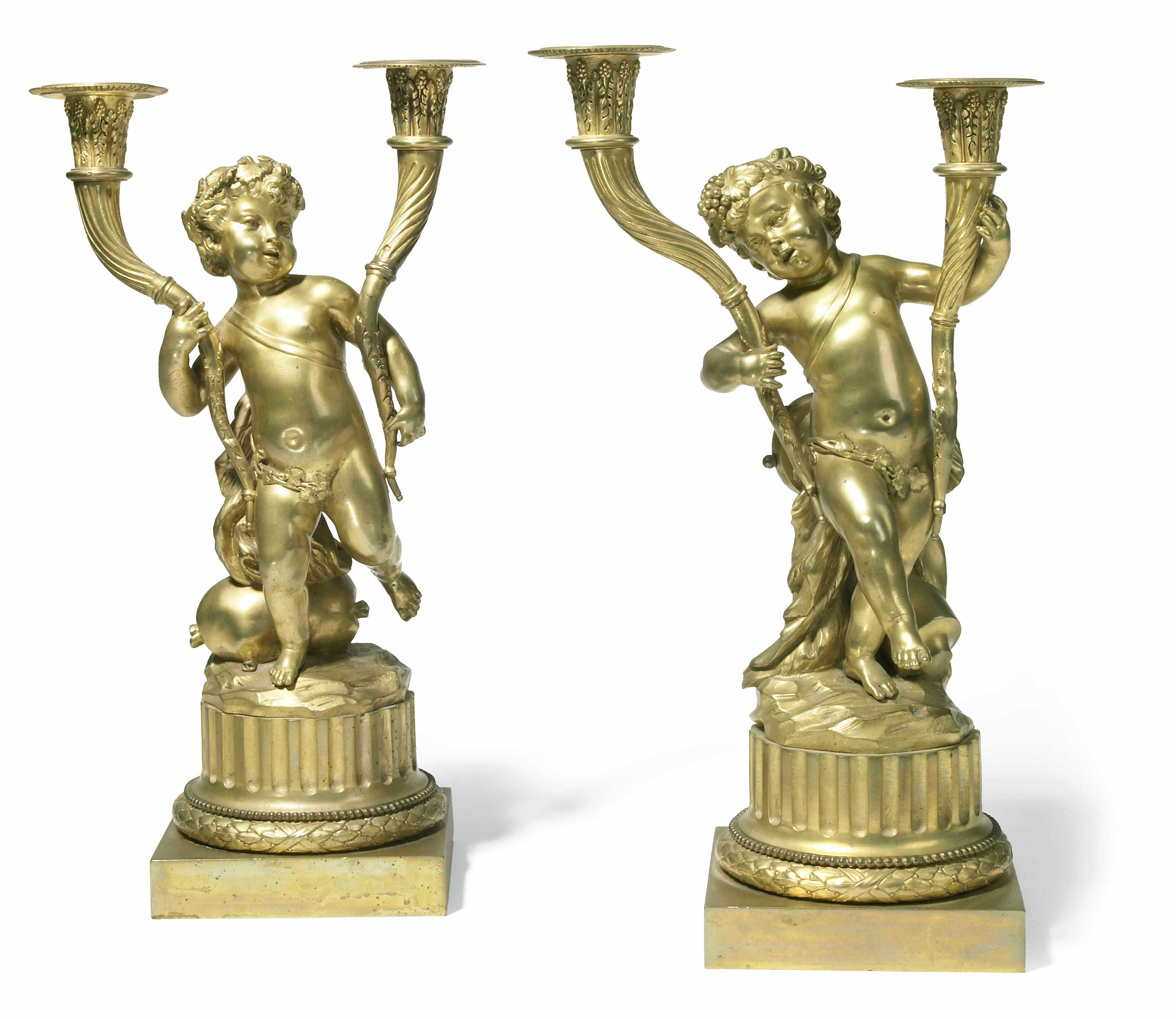 Appraisal: A pair of Louis XVI style gilt bronze two light