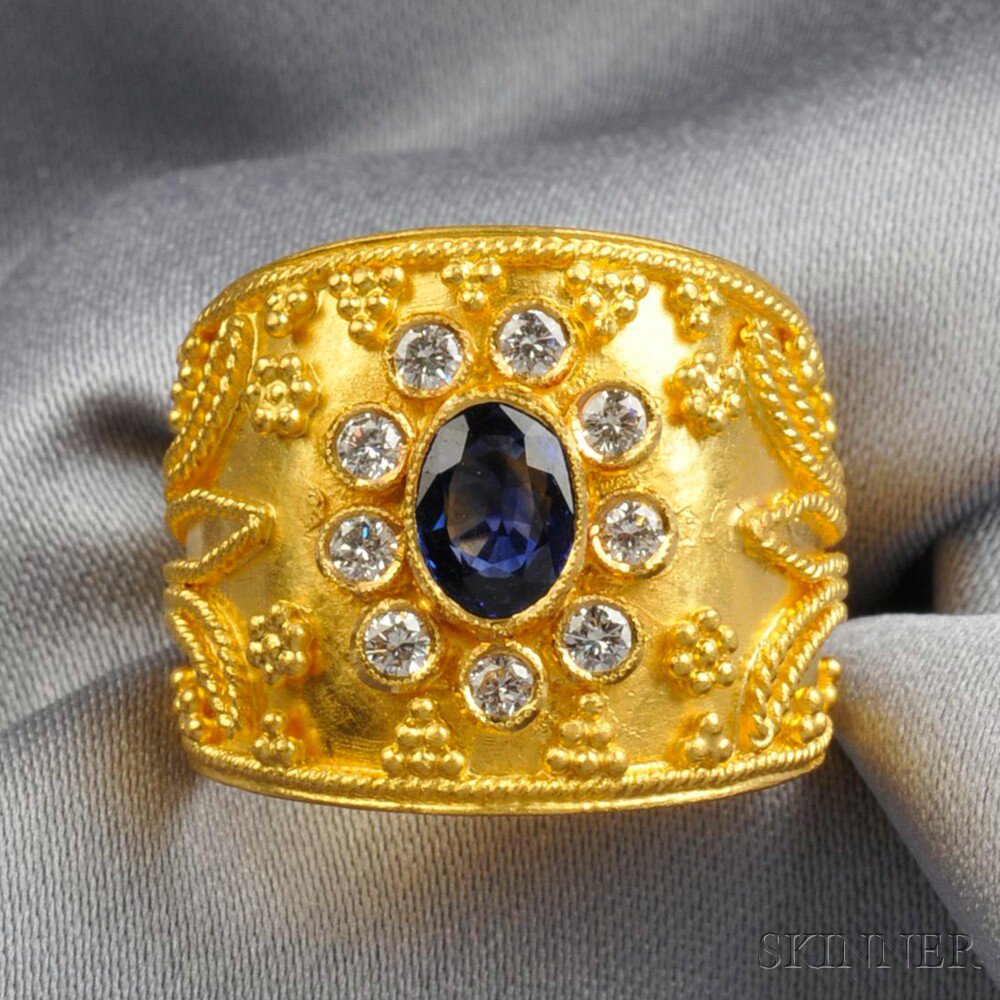 Appraisal: High Karat Gold Sapphire and Diamond Ring bezel-set with an