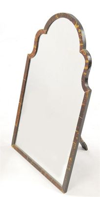 Appraisal: A tortoiseshell framed easel back mirror with a shaped arch