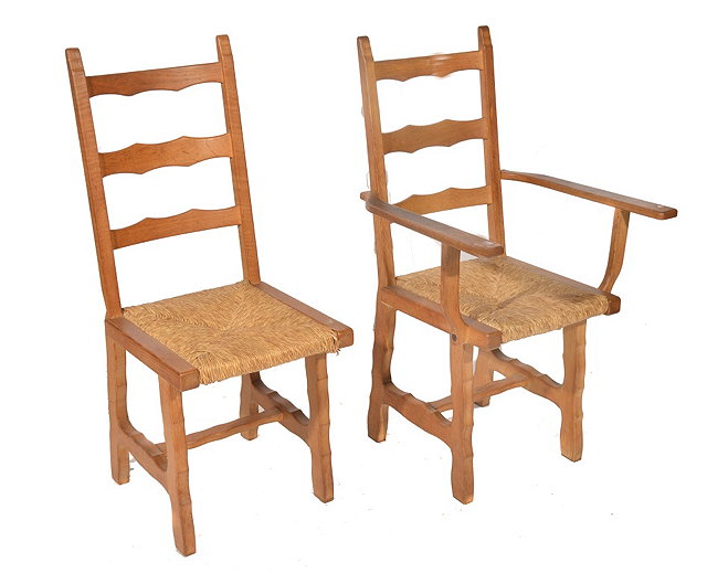 Appraisal: A SET OF TEN COTSWOLD SCHOOL OAK LADDERBACK DINING CHAIRS