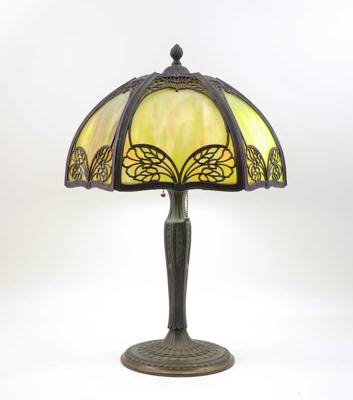 Appraisal: GREEN SLAG GLASS BENT PANEL LAMP Patinated cast iron base