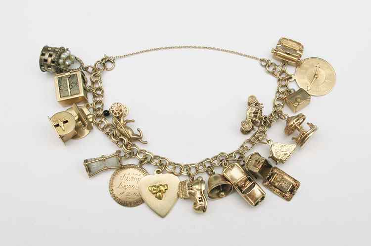 Appraisal: A MOST CHARMING K GOLD CHARM BRACELET K charm bracelet