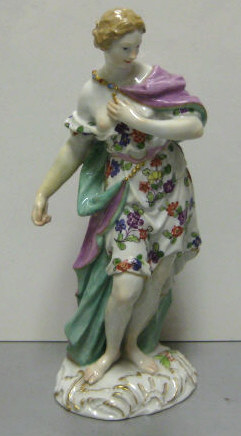 Appraisal: MEISSEN PORCELAIN FEMALE FIGURE Classical maiden wearing floral dress and