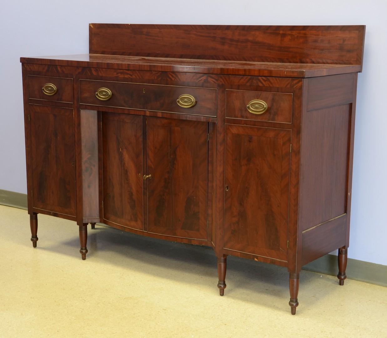 Appraisal: Mahogany Sheraton sideboard with drawers in frieze base with bowed