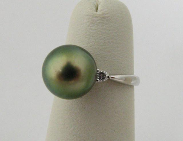 Appraisal: k white gold south sea pearl ring with diamond accents