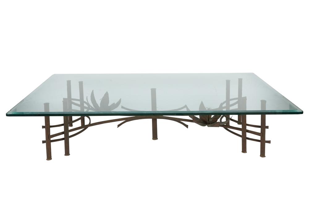 Appraisal: METAL GLASS COFFEE TABLEthe top with beveled edge the base