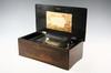 Appraisal: MUSIC BOX - Rosewood grained cylinder music box with six