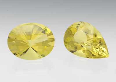 Appraisal: Two Unmounted Yellow Citrine Oval faceted cut citrine weighting ct