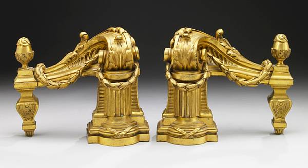 Appraisal: A pair of Regence style gilt bronze chenets late th