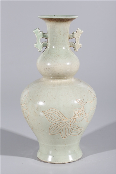 Appraisal: Chinese celadon glaze vase with incised floral designs and molded