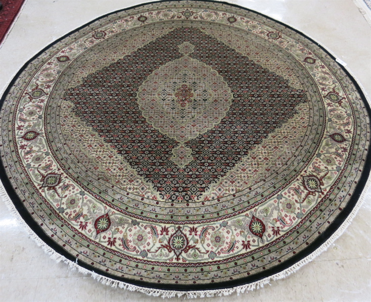 Appraisal: ROUND ORIENTAL CARPET Persian Bidjar design central medallion and Herati