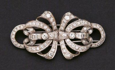 Appraisal: A PAIR OF DIAMOND CLIPS each set in ribbon form