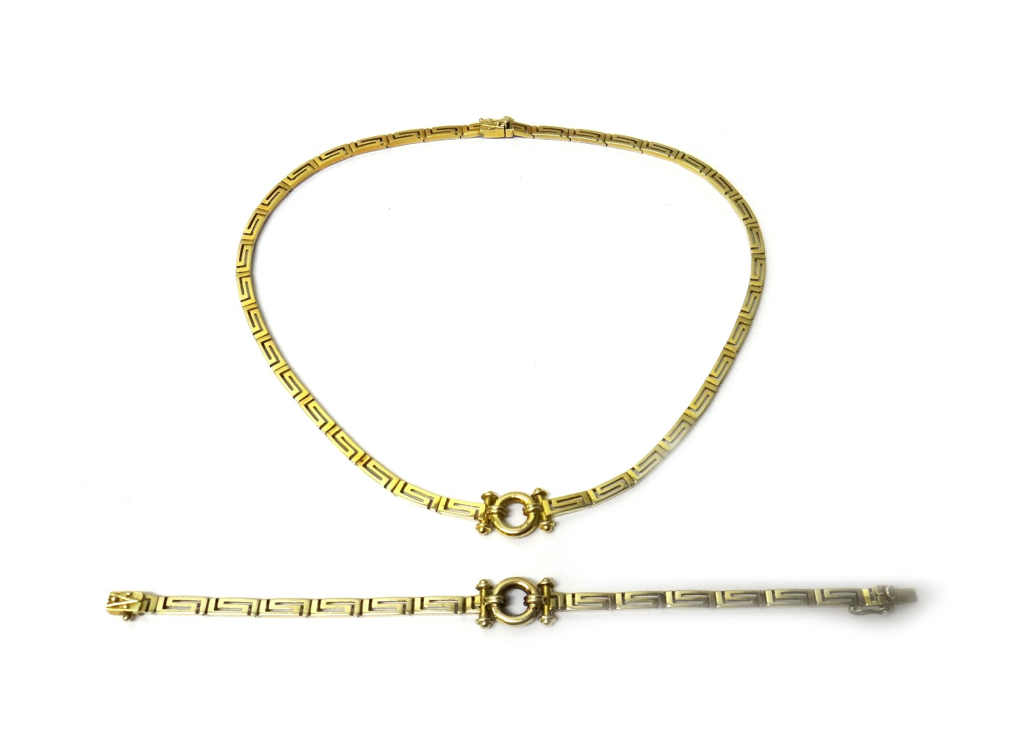 Appraisal: A gold collar necklace in a curved Greek key pattern