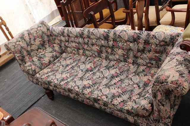 Appraisal: A GEORGE IV SCROLL END SETTEE with plain back loose