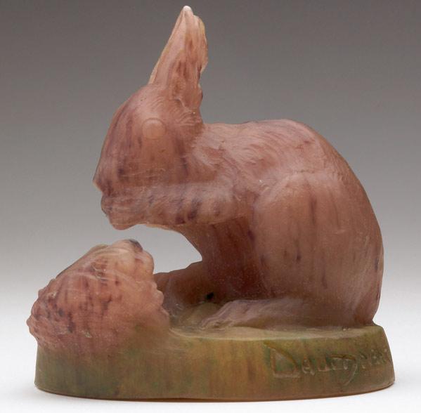 Appraisal: DAUM Pate-de-verre paperweight of a squirrel in mauve on a