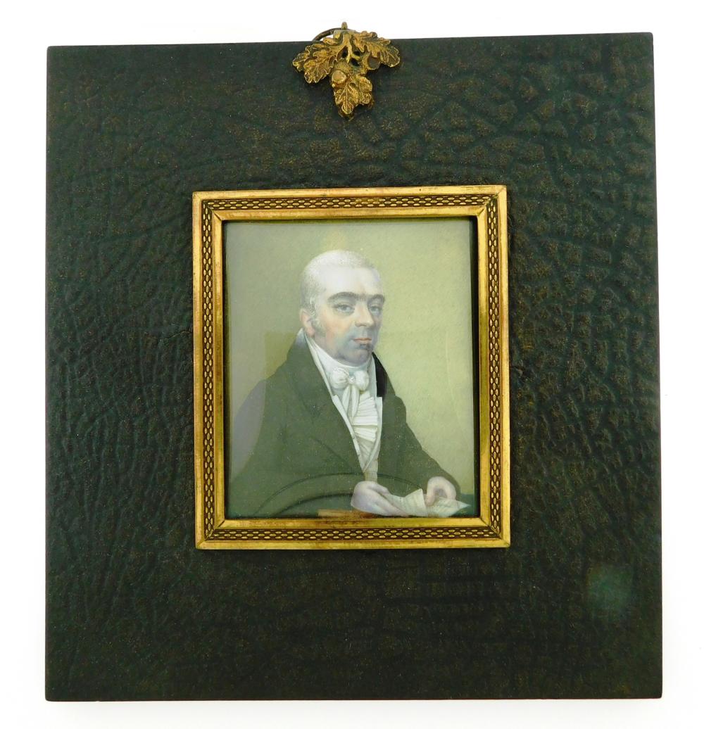 Appraisal: MINIATURE Gentleman rectangular support holding document on tabletop white hair