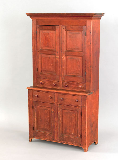 Appraisal: Pennsylvania pine child's two part step back cupboard th c