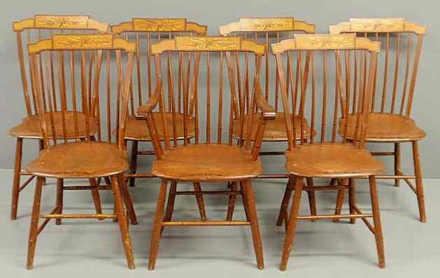 Appraisal: Set of seven Windsor style chairs one armchair six side