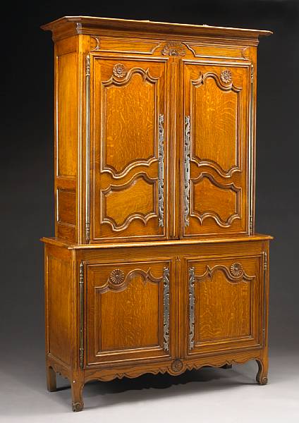 Appraisal: A Louis XV style oak buffet deux corps last quarter